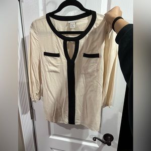 Cream and black V neck blouse